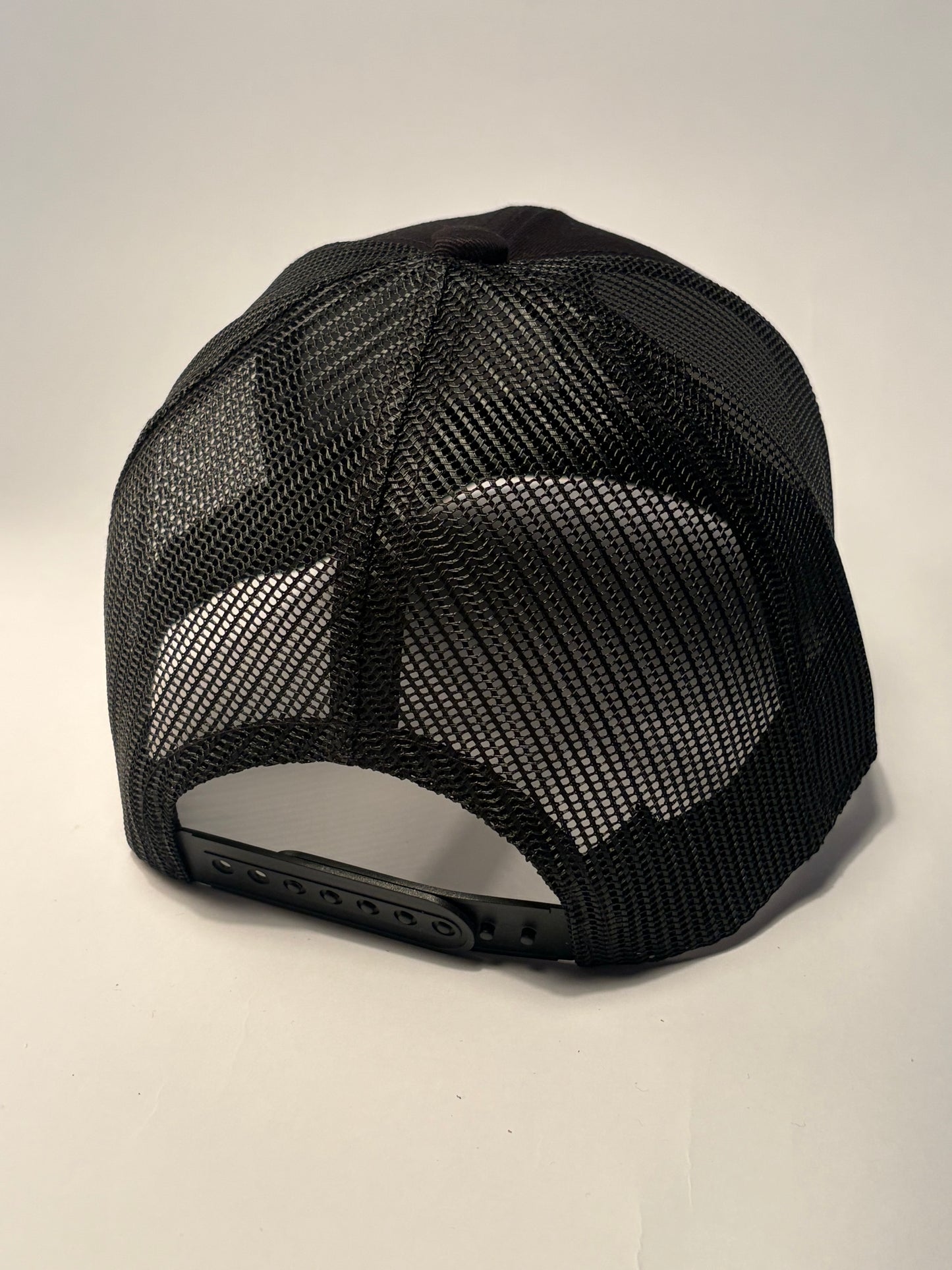 KLYNOIR Black Cotton Trucker Cap with Orange Oval Patch