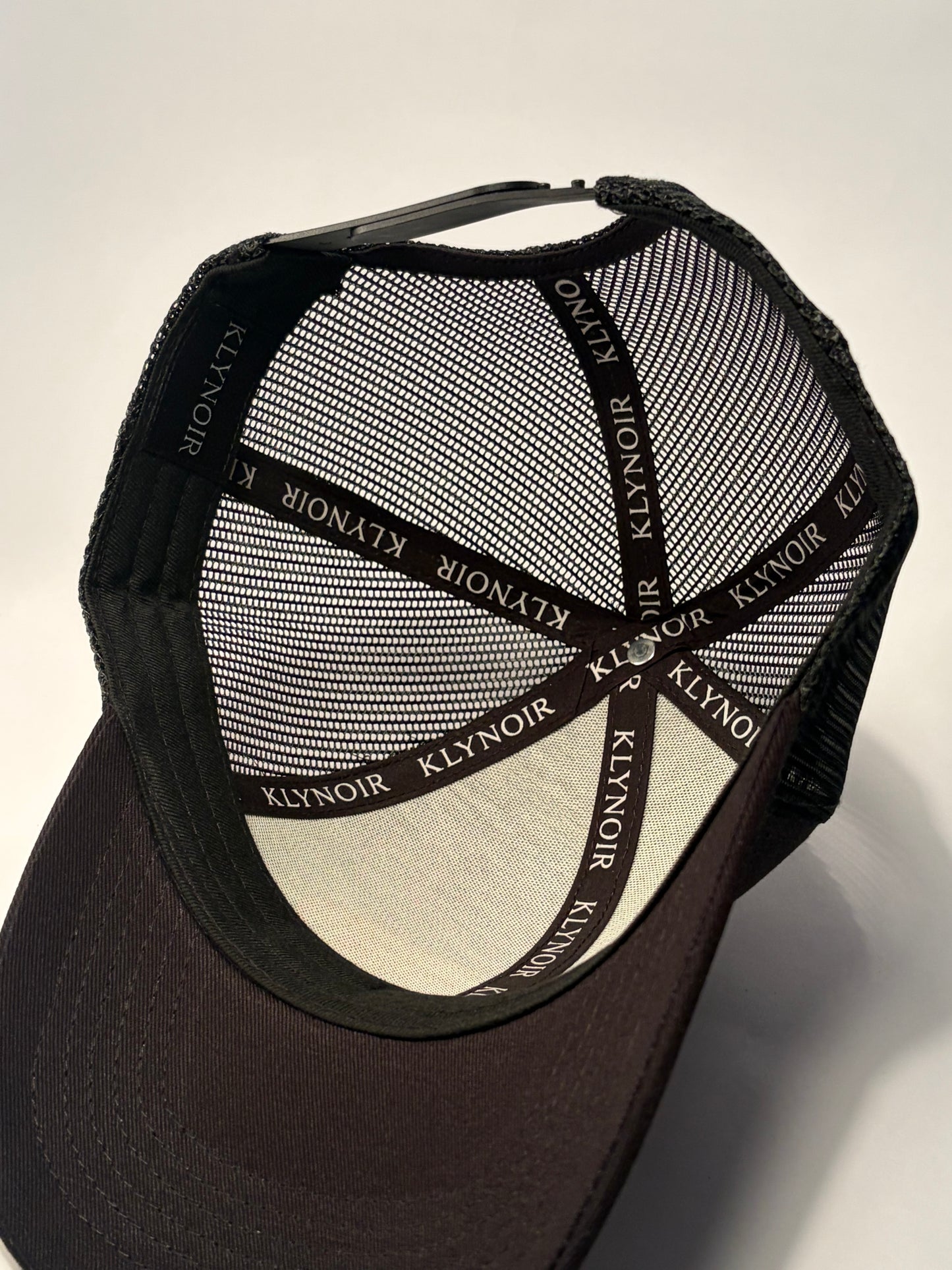 KLYNOIR Black Cotton Trucker Cap with Orange Oval Patch